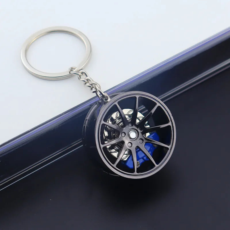 🟡 Racing Tire Hub Keychain – Stylish Metal Pendant for Car Enthusiasts