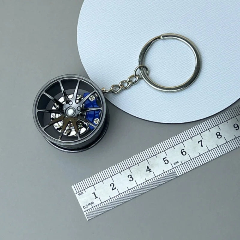 🟡 Racing Tire Hub Keychain – Stylish Metal Pendant for Car Enthusiasts