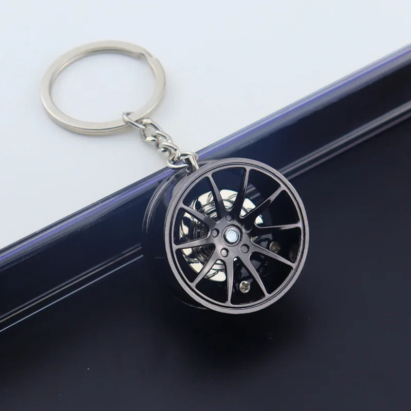 🟡 Racing Tire Hub Keychain – Stylish Metal Pendant for Car Enthusiasts