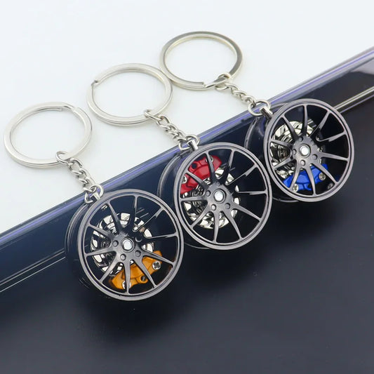 🟡 Racing Tire Hub Keychain – Stylish Metal Pendant for Car Enthusiasts