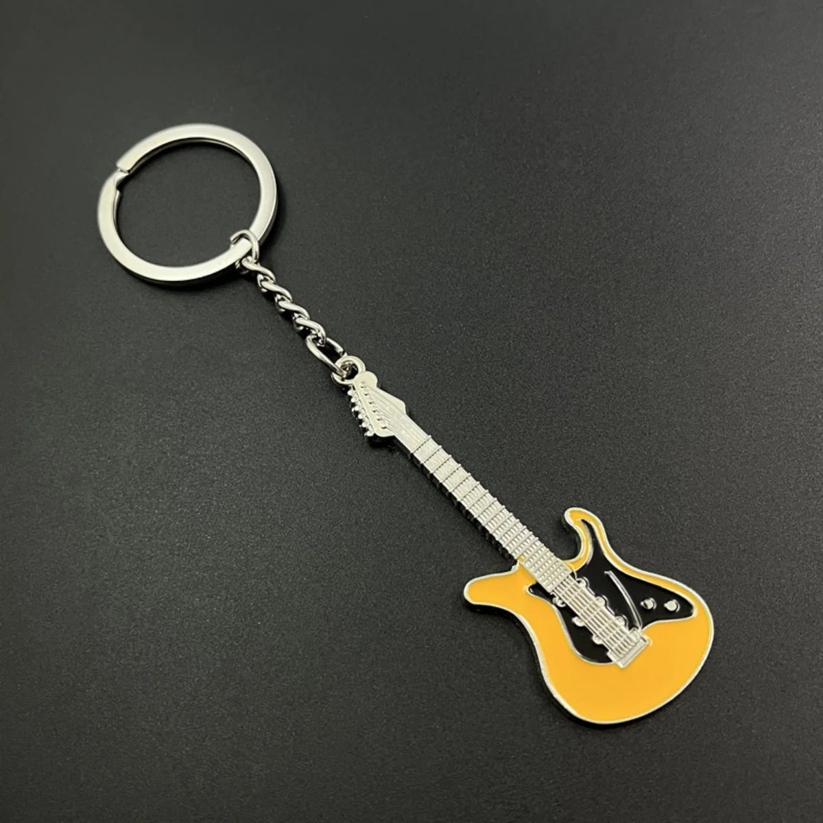 🎸 Creative Mini Guitar Keychain – Shine with Musical Vibes!