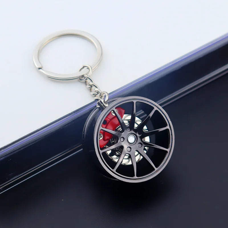 🟡 Racing Tire Hub Keychain – Stylish Metal Pendant for Car Enthusiasts